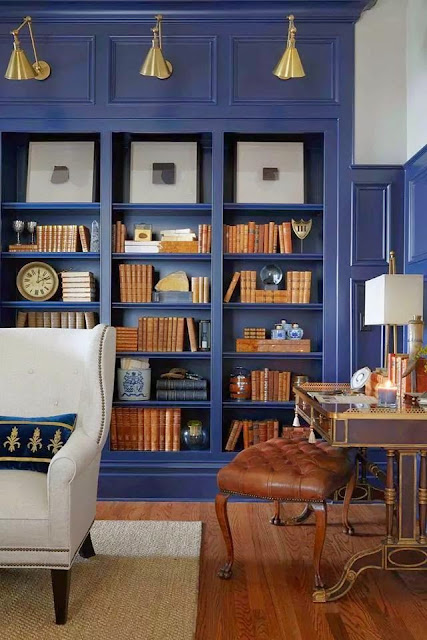 blue painted built in book cases