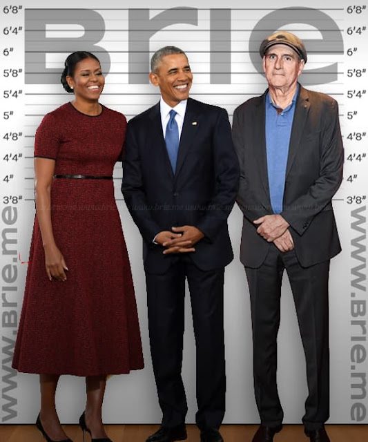 James Taylor standing with Barack and Michelle Obama