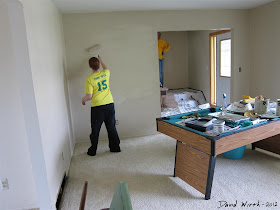 painting the livingroom, pool table, roller paint, brush, tan