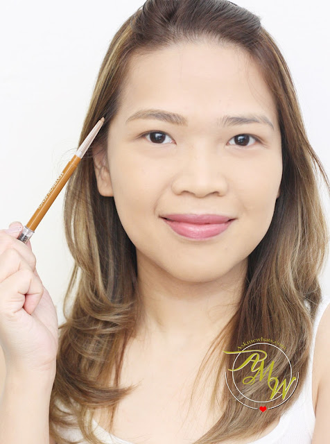 a photo of AskMeWhats Nikki Tiu wearing Cathy Doll Sexy Eyebrow Pencils 