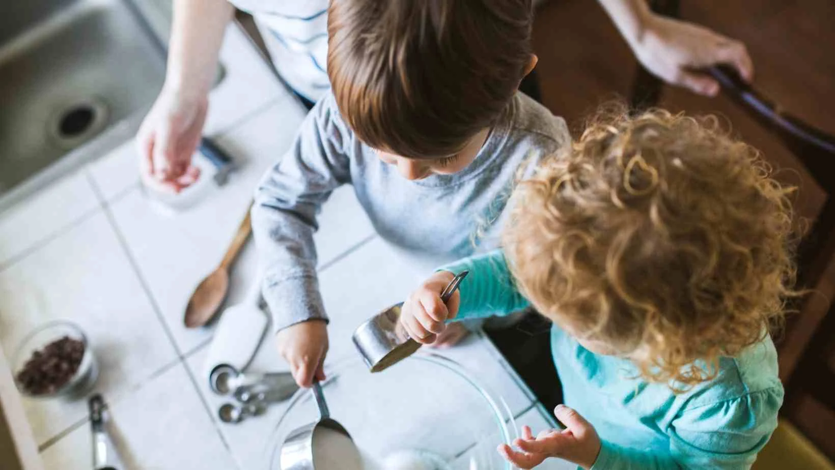 image of children measuring out ingredients from canva pro