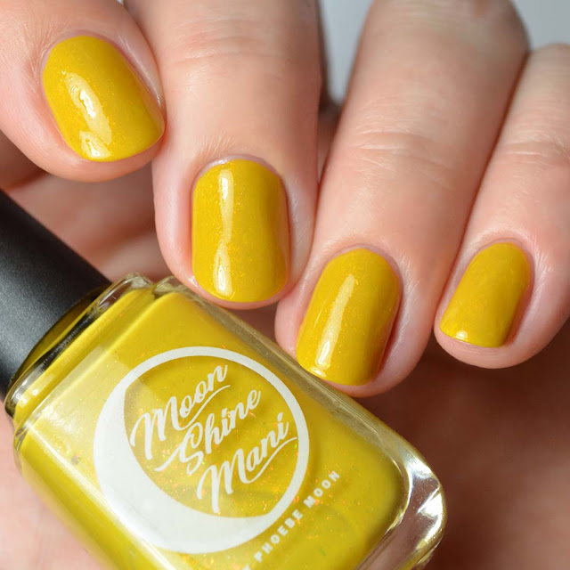 mustard crelly nail polish with flakies