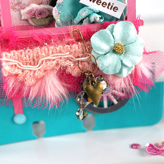 Heidi Swapp Memorydex Valentines Advent Calendar made with the Prima With Love collection by Frank Garcia; die cut 3D sweets cart decorated with ribbon, tulle, paper flowers, stickers, jewels and charms, and has a gift card holder