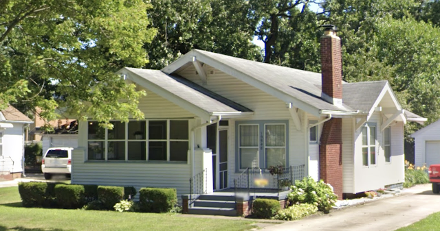 color streetview image of front and side of one-story white house, 9030B floor plan, Sears Clyde bungalow, 19548 Paxson Dr, South Bend, Indiana