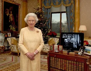 The Queen wears scarab ruby brooch
