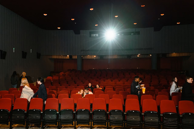 people watching movie in cinema