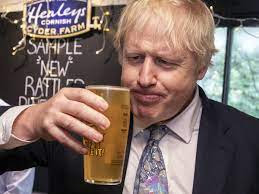  Pictures of Boris Johnson raising a glass of 'former doctor's leave party'