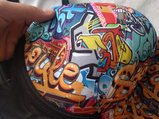 Close up shot of the cup of the Graffiti, showing the bright and detailed print