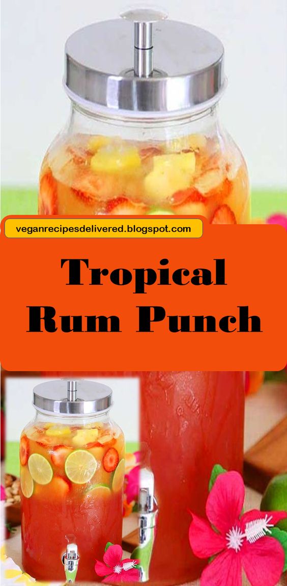 Tropical rum punch is a delicious summer cocktail recipe for a luau party or to sip by the pool! A mix of juice and coconut rum for a pretty layered drink. You'll feel like you're at the beach! #tropical #drinks #recipe #livinglocurto #luau #rum