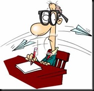 0511-0708-2917-4829_Teacher_Sitting_at_His_Desk_clipart_image