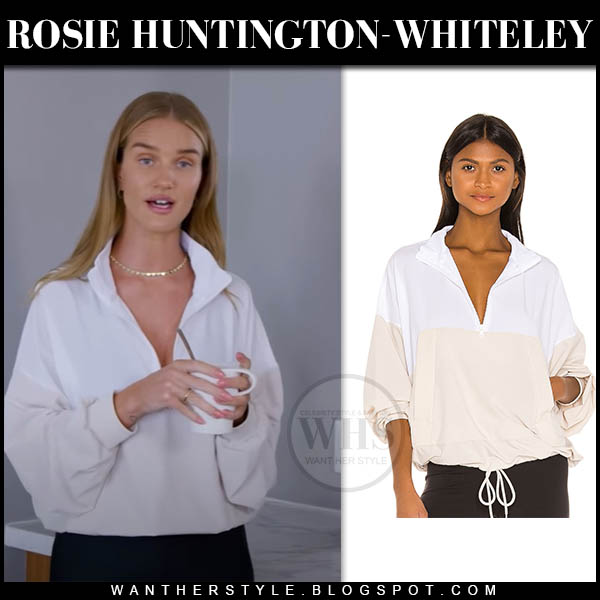 Rosie Huntington-Whiteley in white pullover and black leggings