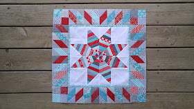 red aqua round robin quilt