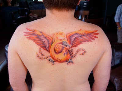 Made more into a chakra on his back, rather than a literal flag. Made more into a chakra on his back, rather than a literal flag.