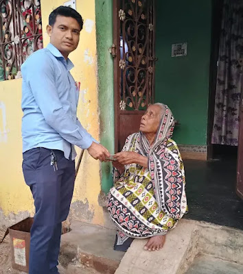 Pension distribution at Korapitha Gram Panchayat for  increase in pension benefits for the 80 year + elderly Beneficiaries
