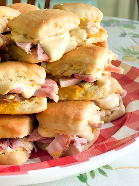 Baked Ham and Angel Biscuits Sliders, a salty cured smoked ham sandwiched between a fluffy buttermilk biscuit.  These are a perfect appetizer to serve at parties.