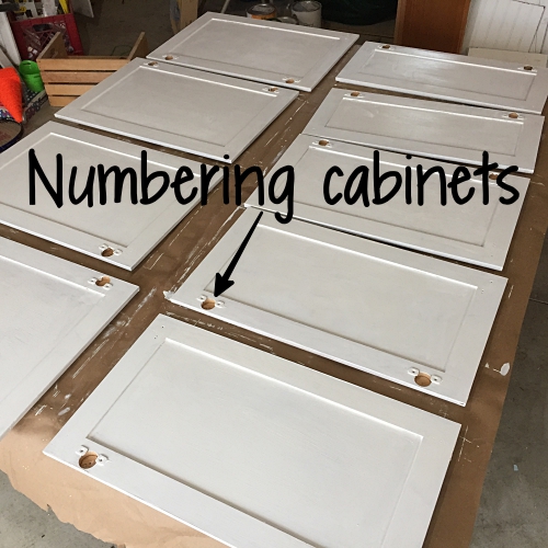 numbered and primed cabinet doors