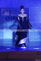 Raveena Tandon walks with Black outfit and Jewellery for Raj Mahtani at HDIL Fashion Show
