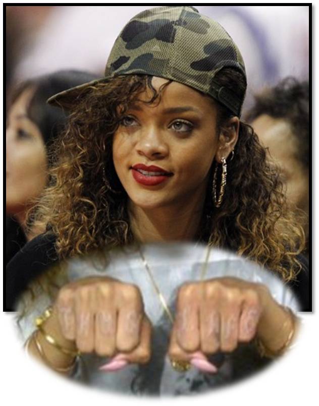 Rihanna new THUG LIFE tattoo in white ink across her knuckles