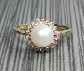sun pearl engagement ring