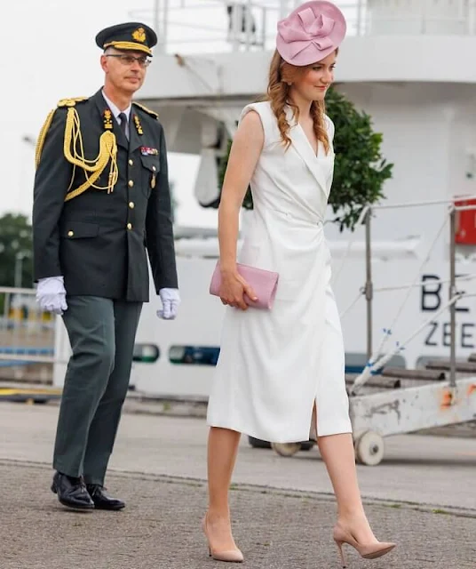 Crown Princess Elisabeth wore a new tuxedo bodycon midi dress by Reiss London. Fabienne Delvigne powder pink hat and rosa pink clutch