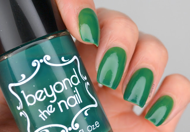 beyond the nail green thermal nail polish swatch holding bottle