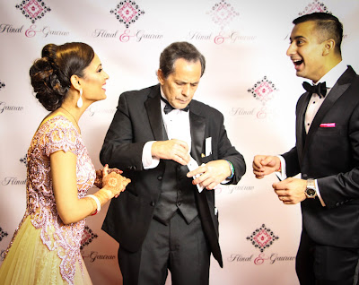 Image of a Bride and Groom and their "Wedding Magician" Joe Ferranti at their reception in Woburn, Massachusetts.