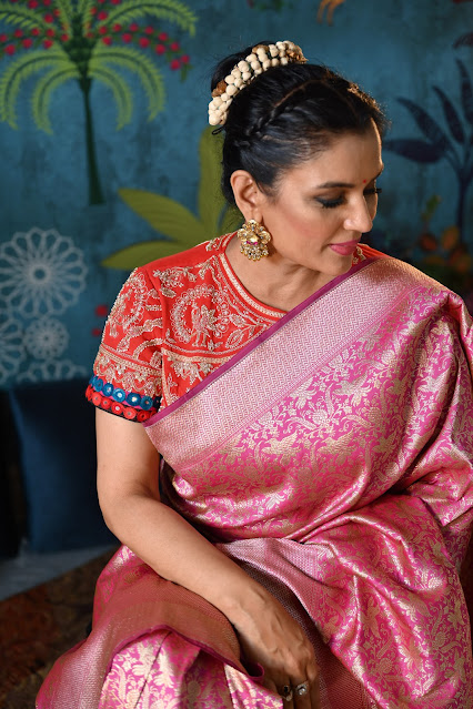 Pinkish lavender Banarasi  handloom saree with birds.