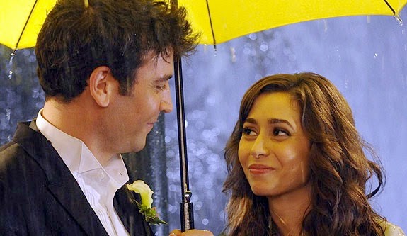 Josh Radnor as Ted Mosby smiling at Cristin Milioti as the Mother, Tracy McConnell, under a yellow umbrella