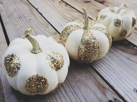 white mini pumpkin with gold glitter