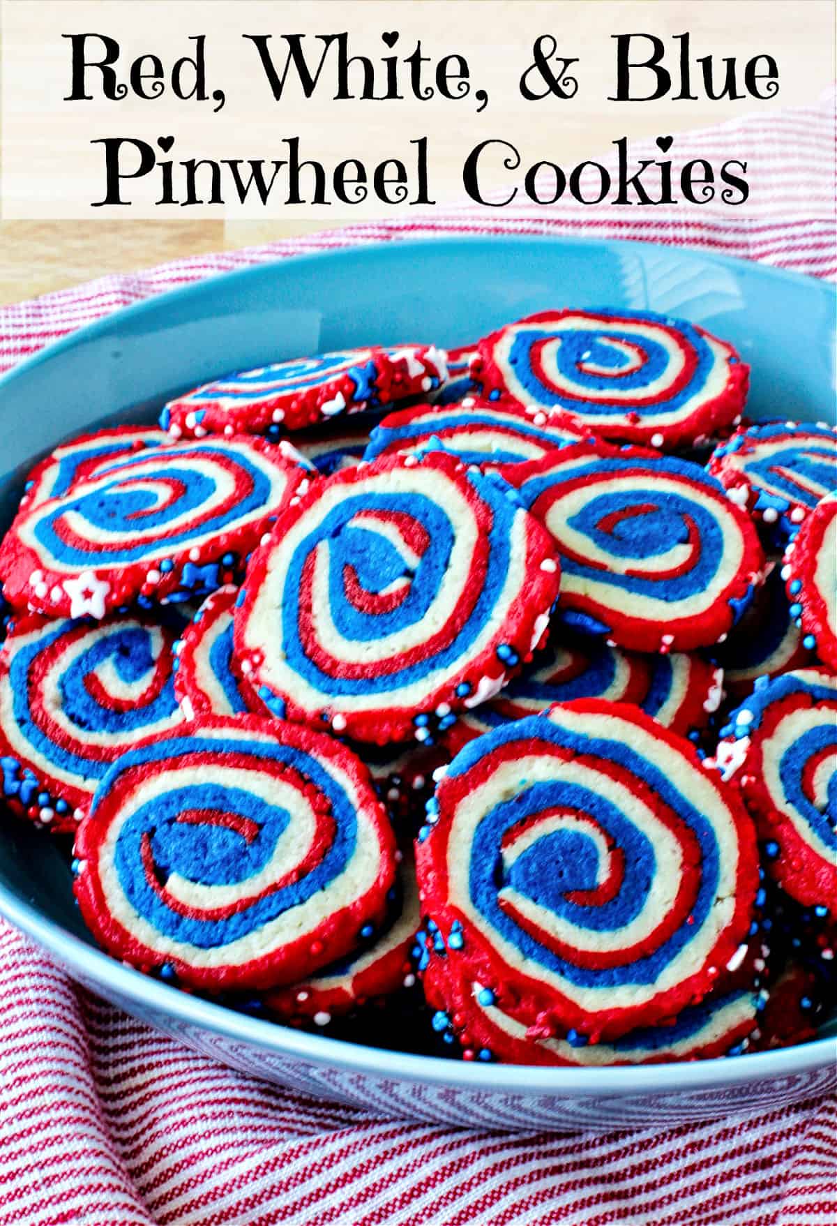 Red, White, & Blue Pinwheel Cookies in a blue bowl.