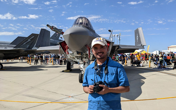 Posing with a U.S. Navy F-35C Lightning II during the Aerospace Valley Air Show at Edwards Air Force Base, CA...on October 15, 2022.