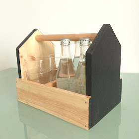 http://labuhardilla.bigcartel.com/product/portabotellas-black-and-wood