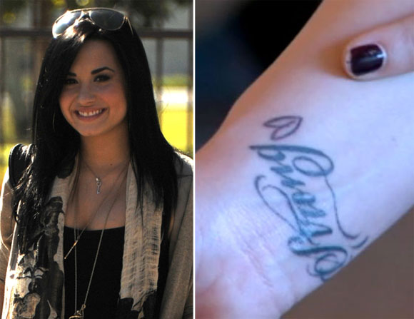 After leaving rehab Demi started to display a tattoo on his wrist that says