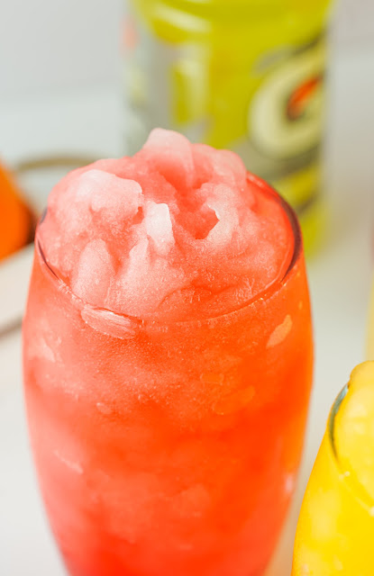 red slushie in a glass.