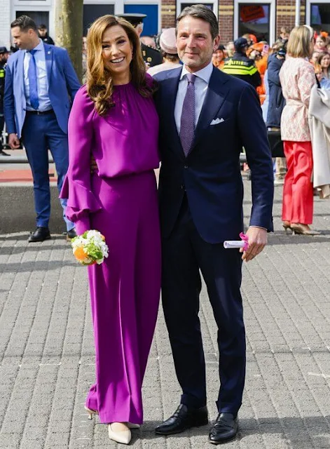 Princess Amalia wore a fuchsia red suit by Marina Rinaldi. Princess Ariane wore a suit by Max & Co. Maxima wore a dress by Natan