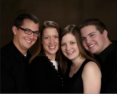 Photo of four siblings to be used as example by Photoshop teacher