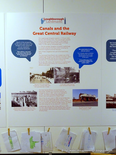 An information board with text about the canal and the Great Central Railway