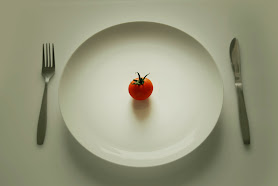 Plate with small tomato