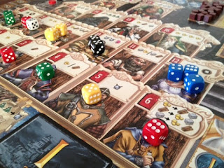 dice on board while playing Kingsburg
