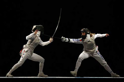Top Fencing girls Maria Valentina Vezzali(R) and Nam Hyun-hee compete