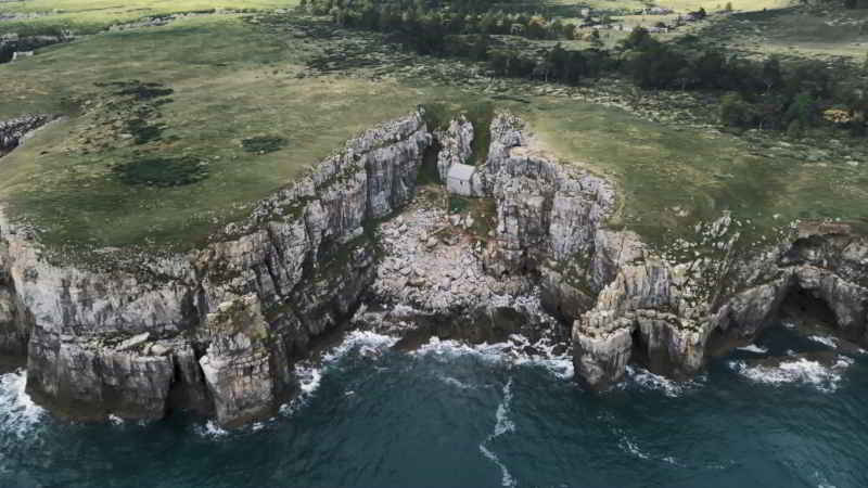 Mrs Coulter house on a cliff