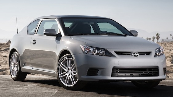 Front 3/4 view of gray 2011 Scion tC parked