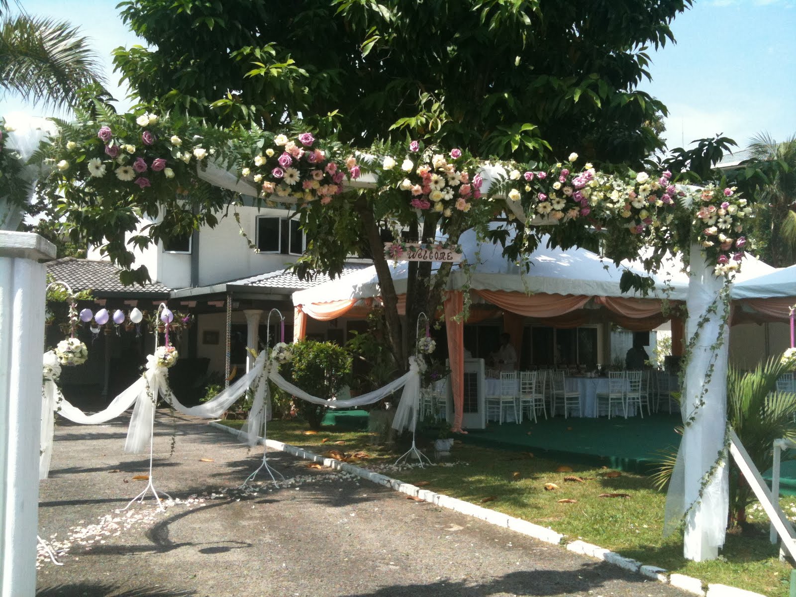 outside weddings on a deck decks decorated with greenry for weddings