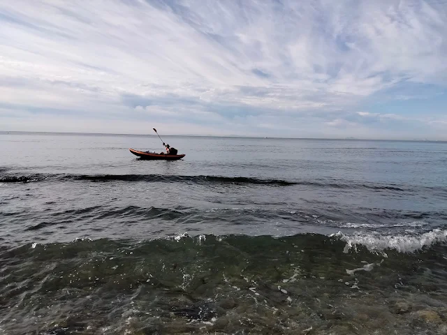 The sea and I paddling in the boat