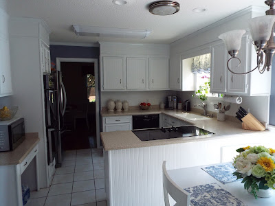 refaced cabinets using wall paper