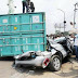 Two Escape Death as Containers Falls On Vehicle In Onitsha 
