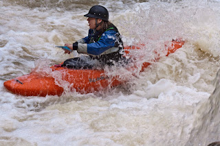 Kayaker at Fallingwater Falls