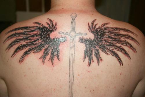 Memorial Cross Tattoo With Angel Wings On Back 1 
