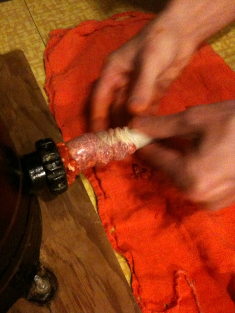 fully inserting the nozzle into the casing