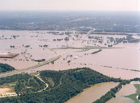 Historic flooding on the Missouri River on July 30, 1993, just north of Jefferson City, Missouri. Midwest floods in 1993 caused a 33% loss in U.S. corn production. (Image credit: Missouri Highway and Transportation Department) Click to Enlarge.